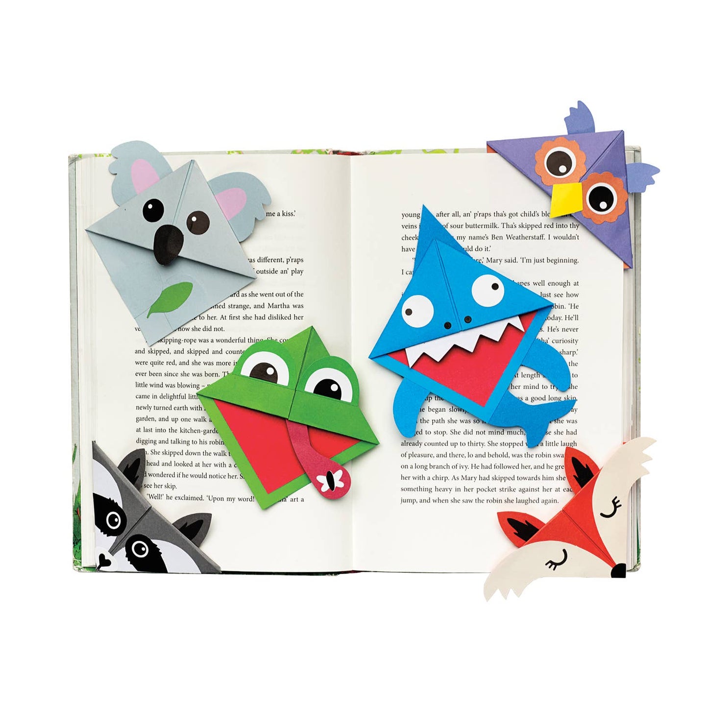 Colorful animal-shaped bookmarks on an open book
