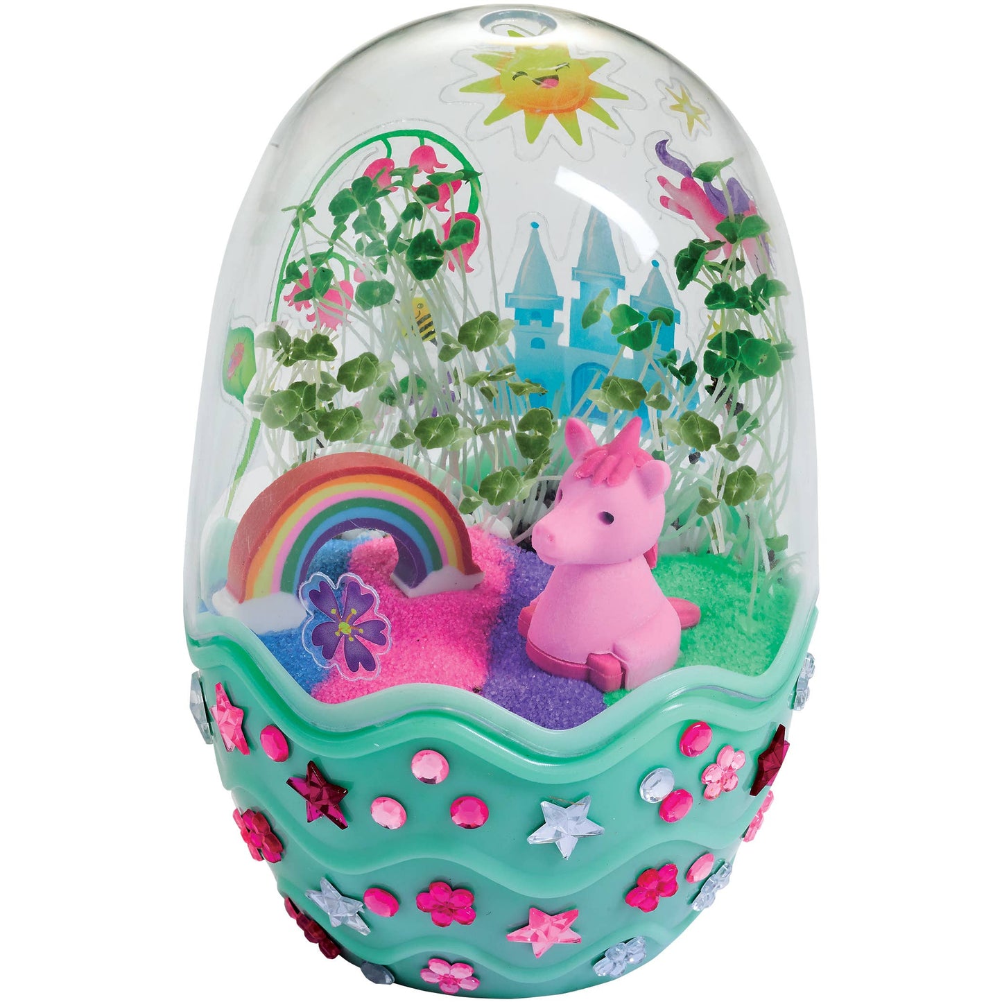 Colorful toy egg with a unicorn, rainbow, and castle inside on a white background