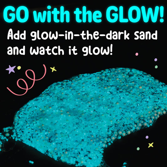 Glow-in-the-dark sand with text 'GO with the GLOW! Add glow-in-the-dark sand and watch it glow!' on a black background.