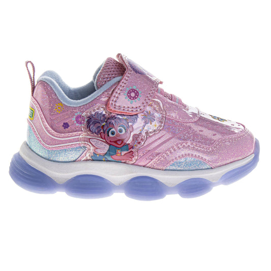 Pink children's shoe with character design on a white background 1