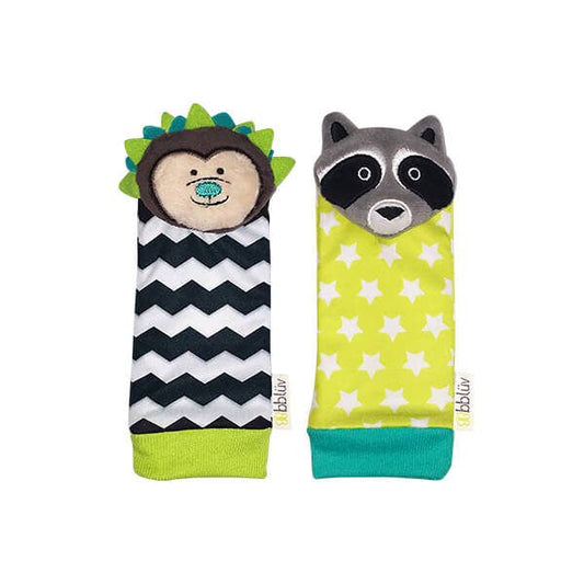 Two children's socks with hedgehog and raccoon designs on a white background