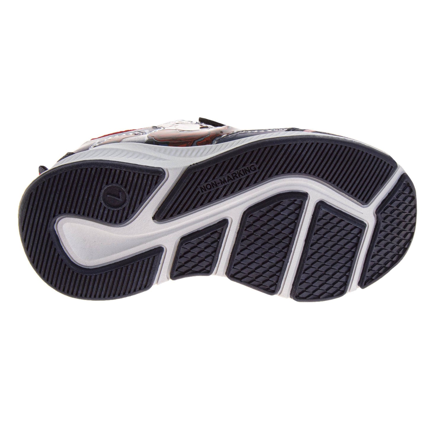 Close-up of a shoe sole with tread pattern on a white background