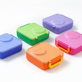 Set of colorful rectangular containers with lids on a white background