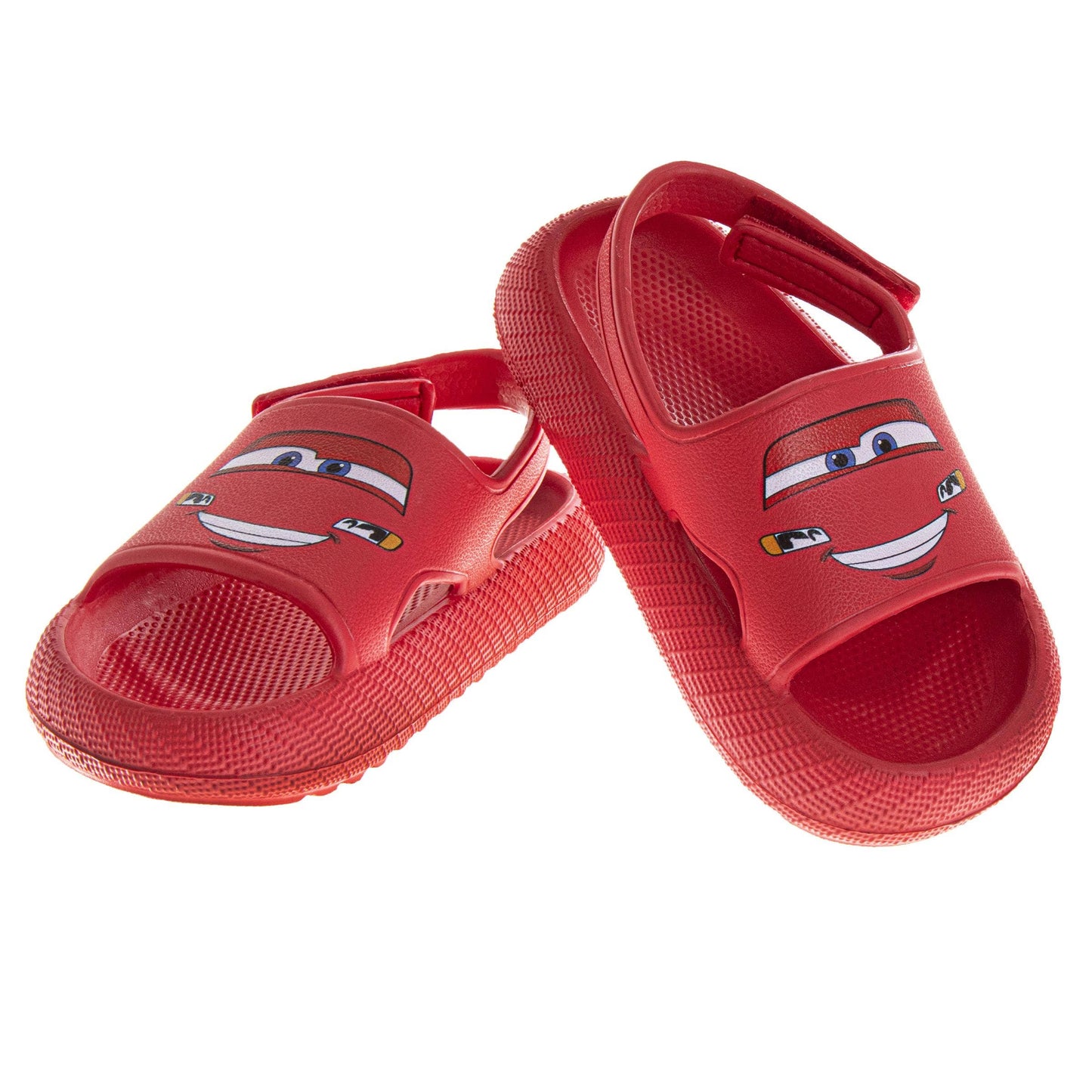 Red children's sandals with cartoon face design on a white background