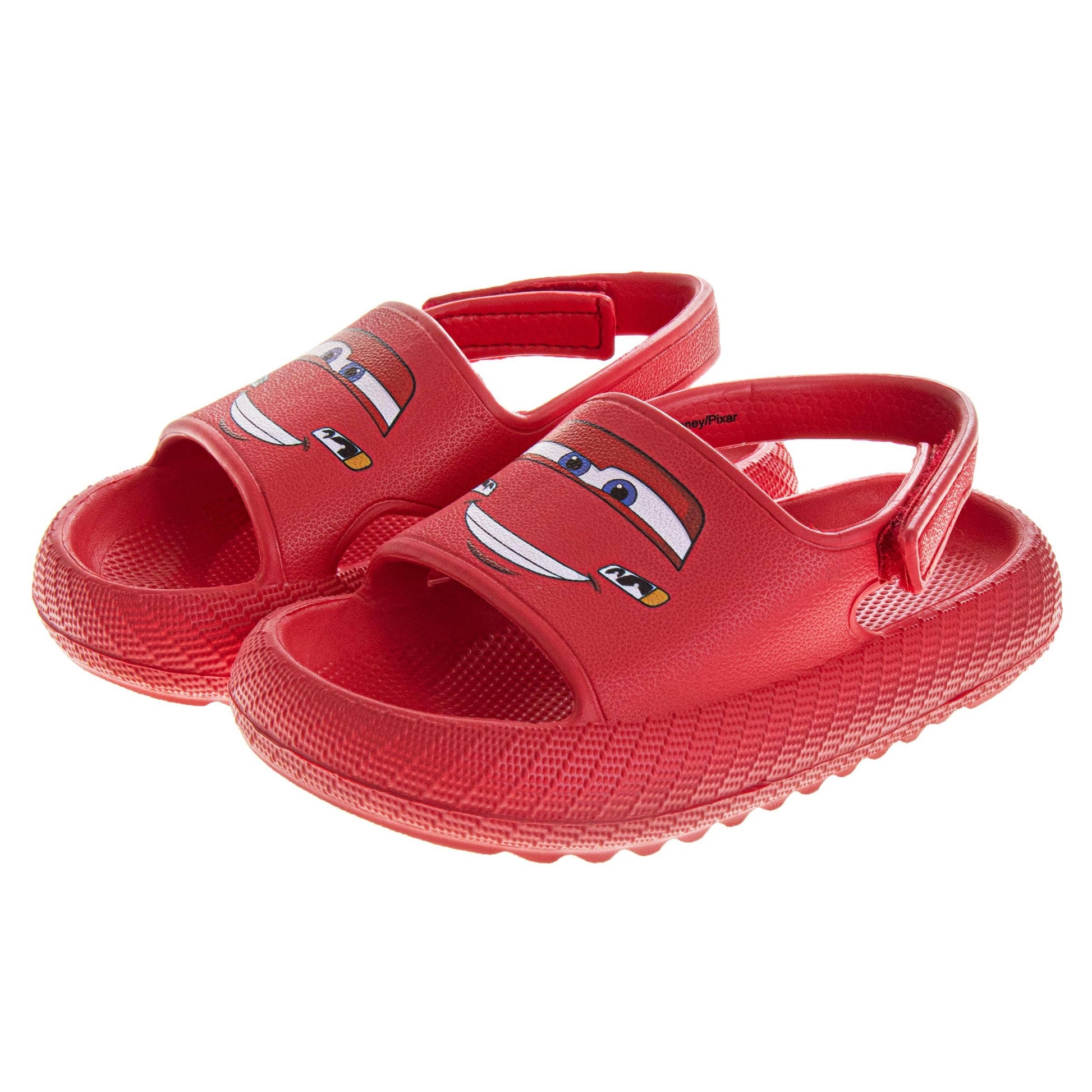 Red children's sandals with cartoon face design on a white background 1