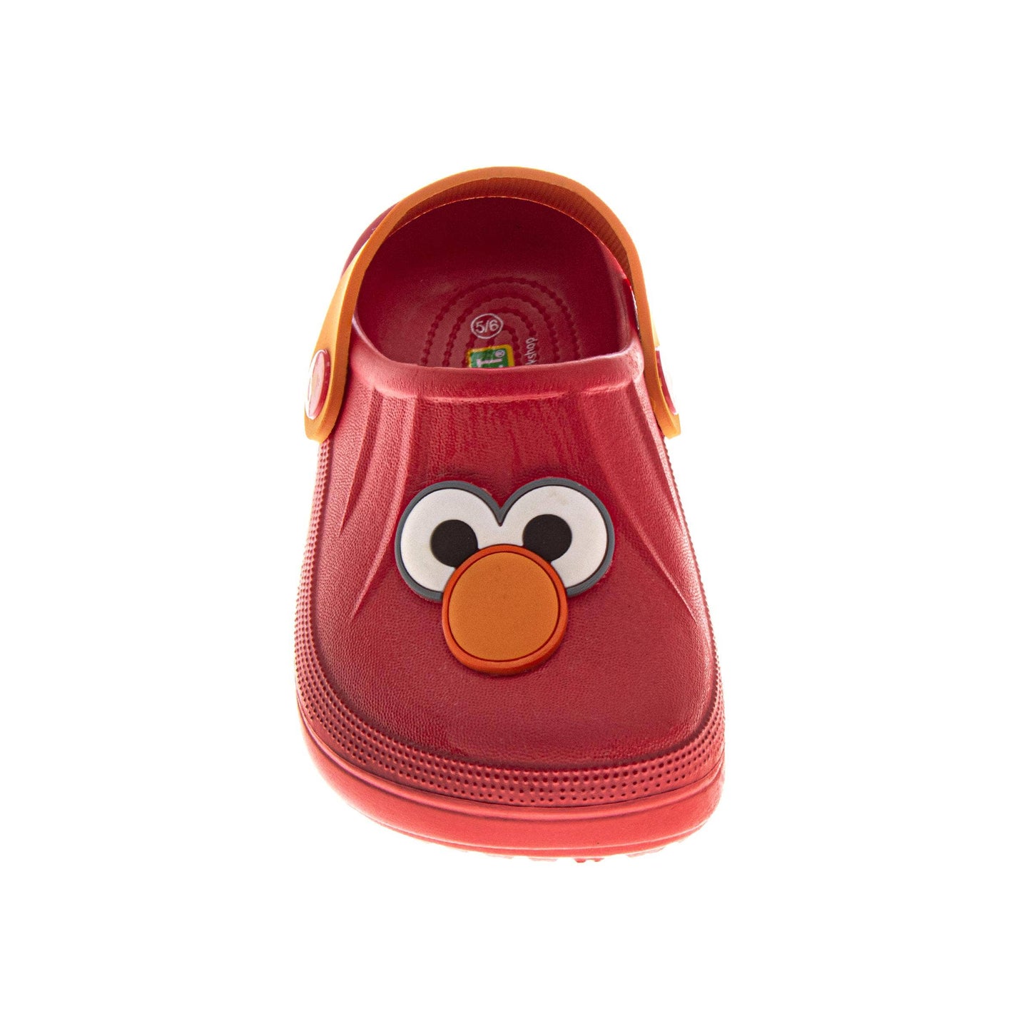 Red children's shoe with a cartoon face design on a white background