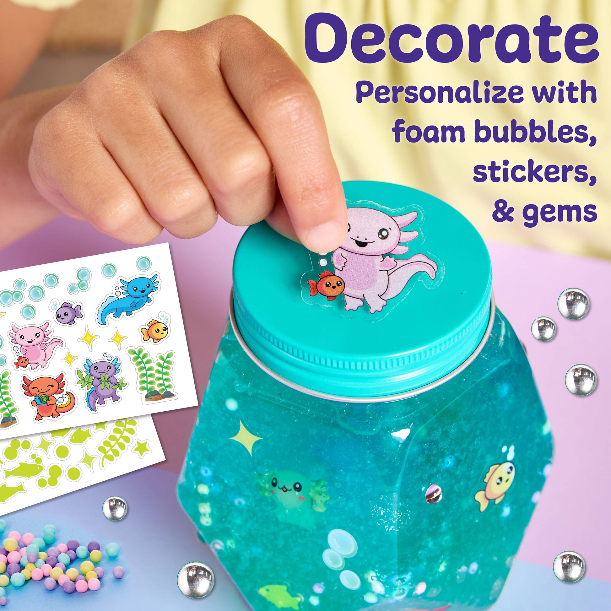 Teal sensory jar with stickers and decorative elements on a colorful background